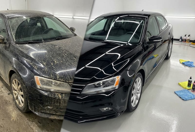 Heavily soiled black vehicle before full showroom restoration